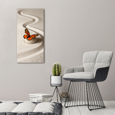 Foto obraz akryl pionowy Kamień zen i motyl