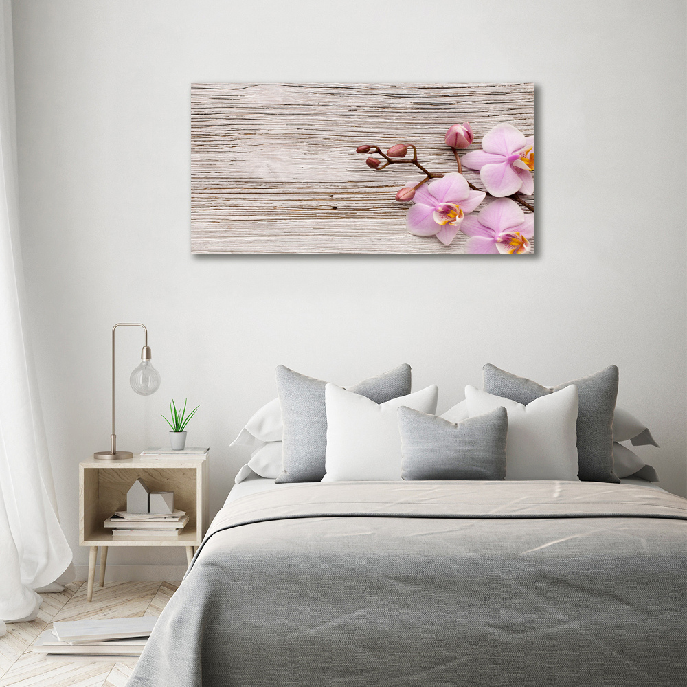 Foto obraz na płótnie Orchidea na drewnie