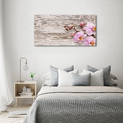 Foto obraz na płótnie Orchidea na drewnie