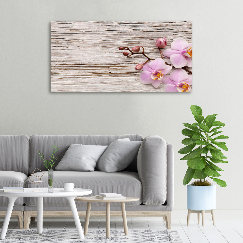 Foto obraz na płótnie Orchidea na drewnie