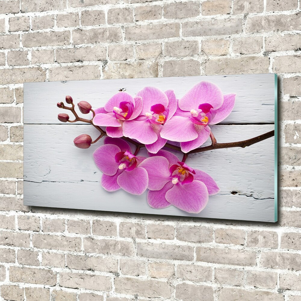 Foto obraz szklany Orchidea na drewnie